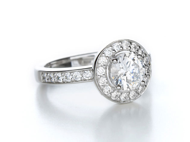 Fine Silver Ring with multiple melee diamonds embedded